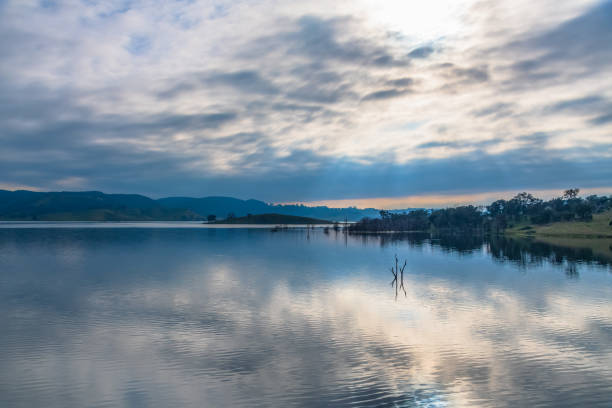 istock Early morning at Windamere Dam with cloud cover 2195783966