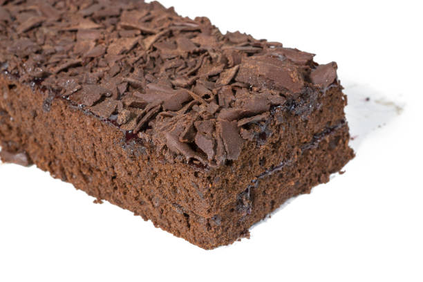 istock Close-up of a rectangular chocolate cake with a layer of chocolate shavings on top 2195786547
