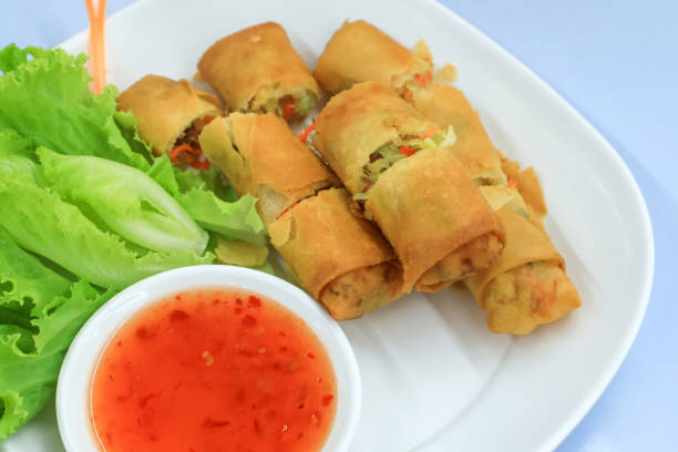 istock Top view of Fried spring rolls on dish. Vegetarian food 2195787956