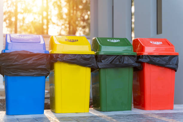 istock Different Colored Recycling Bins in an Office Encouraging Eco-friendly Waste Disposal. 2195788552