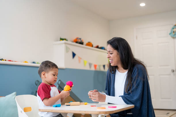 istock Mother and young son playing together 2195791488