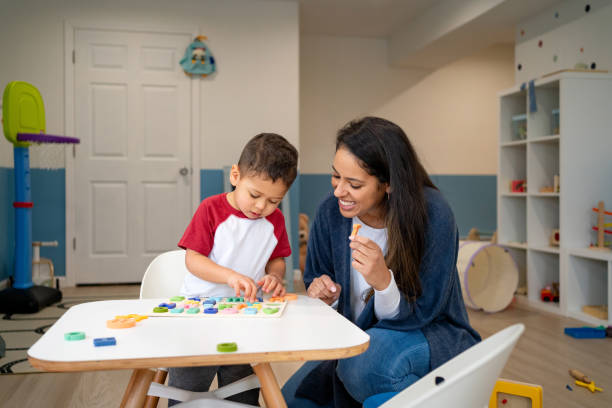 istock Mother and young son playing together 2195791499