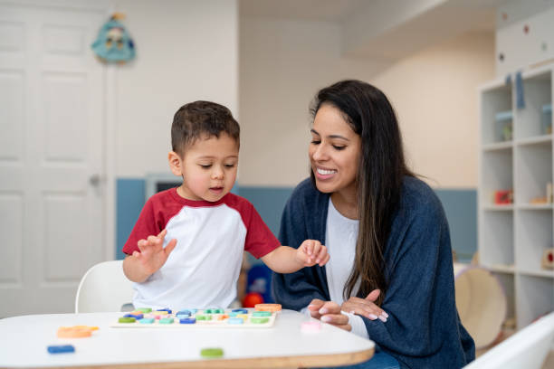 istock Mother and young son playing together 2195791509