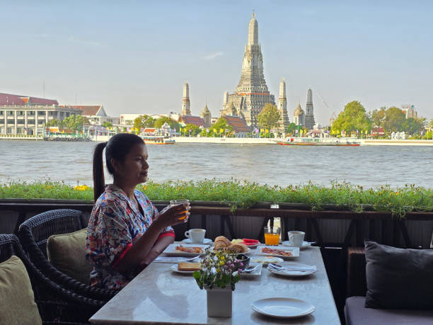 istock Enjoying a serene breakfast view at a riverside cafe in Bangkok Thailand 2195796416