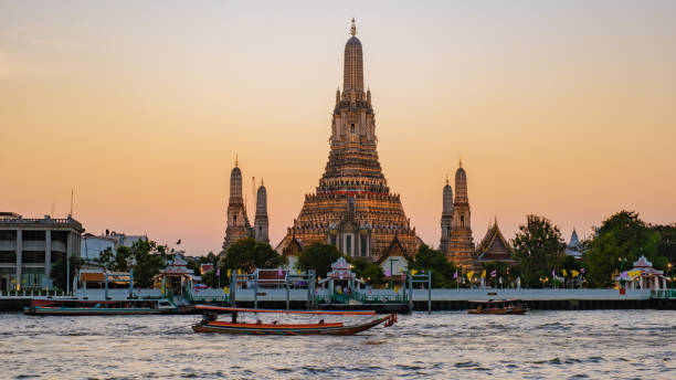 istock Sunset over Wat Arun in Bangkok, Thailand creates a stunning riverside view 2195798176