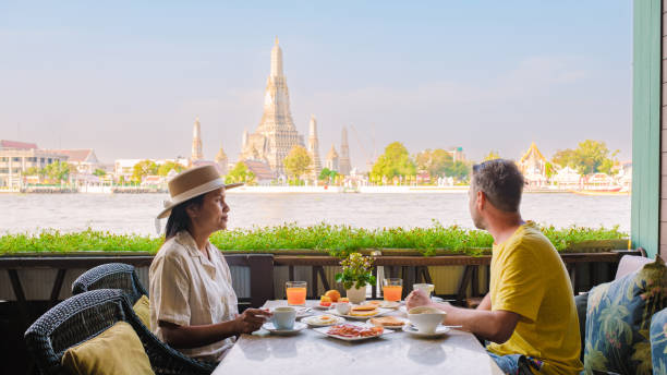 istock Discovering Bangkoks beauty while enjoying a serene breakfast by the river 2195798643