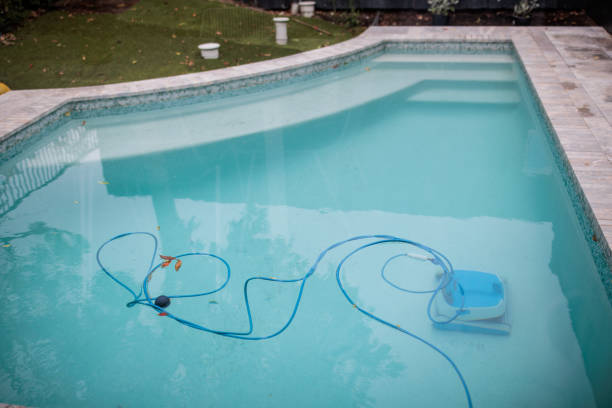istock Robotic cleaner cleaning swimming pool 2195801210