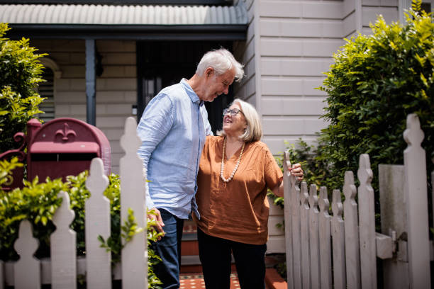 istock Elderly Woman Greets Husband at the Gate 2195803378