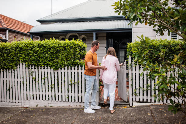 istock Family arriving home 2195803436