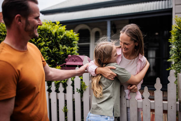 istock Woman Greets Her Loved Ones 2195803691