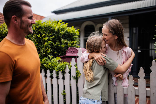 istock Woman Greets Her Loved Ones 2195803739