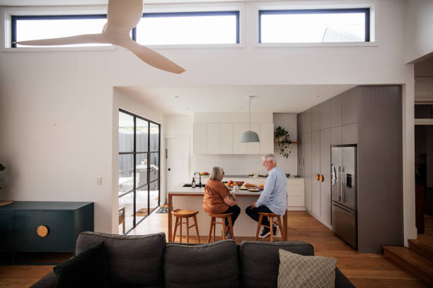 istock Elderly couple enjoys breakfast at home 2195804466