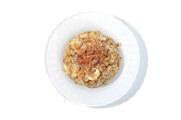 istock fried rice on a white plate isolated on white background 2195805756