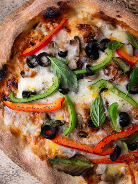 istock Homemade Sourdough pizza on Wooden Table. 2195809085