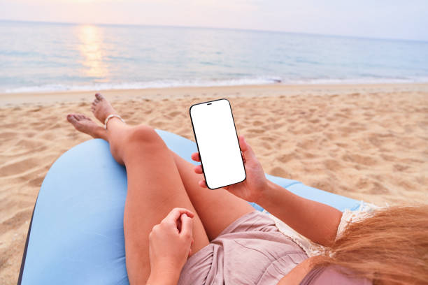 istock Mockup smartphone with a white blank screen for traveling holiday vacations 2195810049