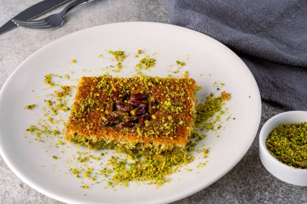 istock Traditional Turkish dessert kadaif with pistachios 2195812019