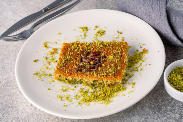 istock Traditional Turkish dessert kadaif with pistachios 2195812056