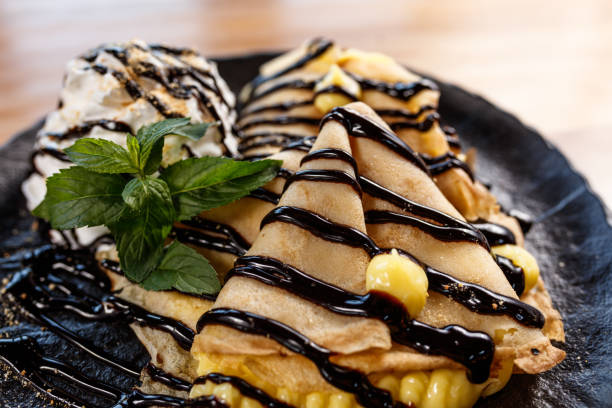 crepe suzette thin pancakes chocolate cheese fresh delicious snack healthy meal food snack on the table copy space food