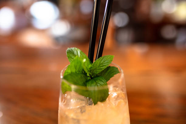 istock Refreshing Cocktail with Mint Leaves and Ice in a Bar Setting 2195814658