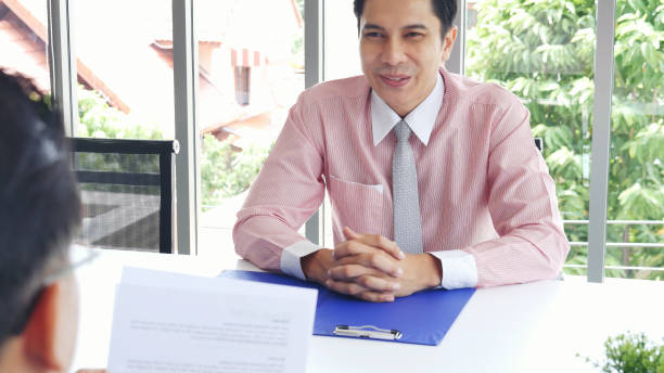 istock Job Interview with headhunter agent and applicant. Job HR applicants having an interview with Human resource manager jobs interviewing with confident candidate at business firm office give cv resume 2195814845