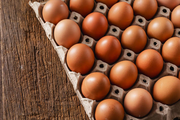 istock Fresh eggs from the farm on wooden background 2195816359