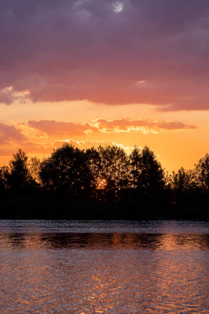 istock landscape on the lake at dusk at sunset 2195816579