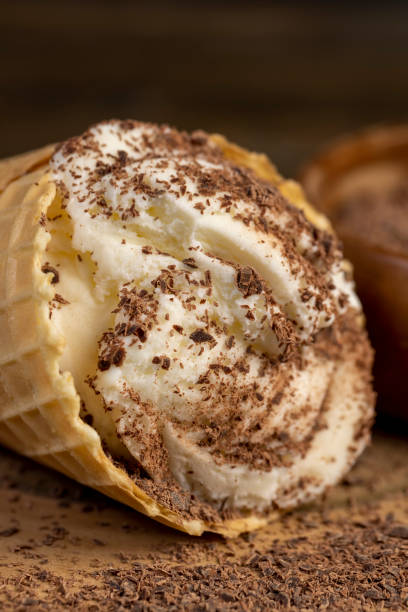 istock creamy white ice cream with chocolate pieces on the table 2195816602