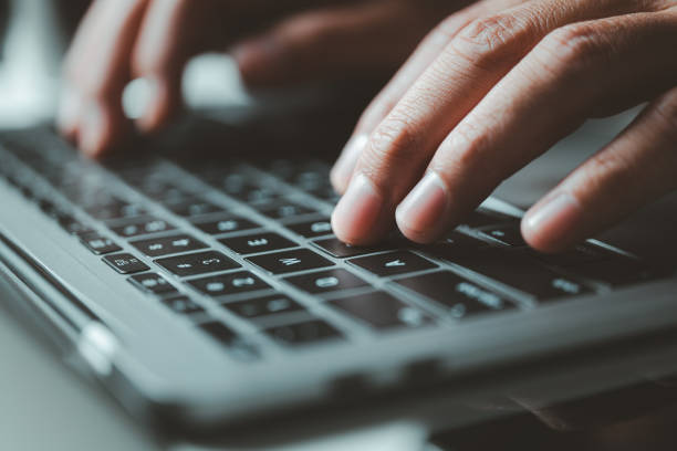 istock Focused productivity: Turning ideas into action with every keystroke. Effort in motion: Harnessing technology for efficient digital work. 2195822730