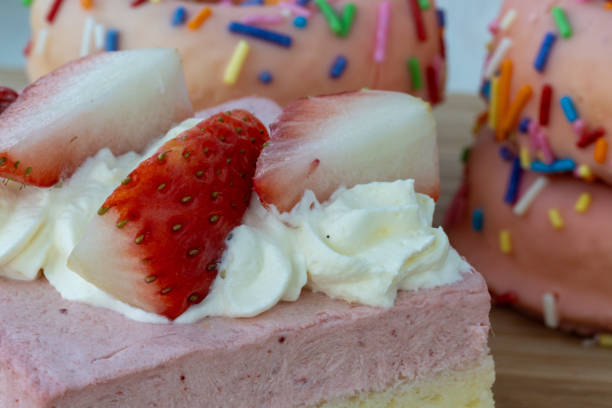 istock cake with strawberries and cream 2195823203