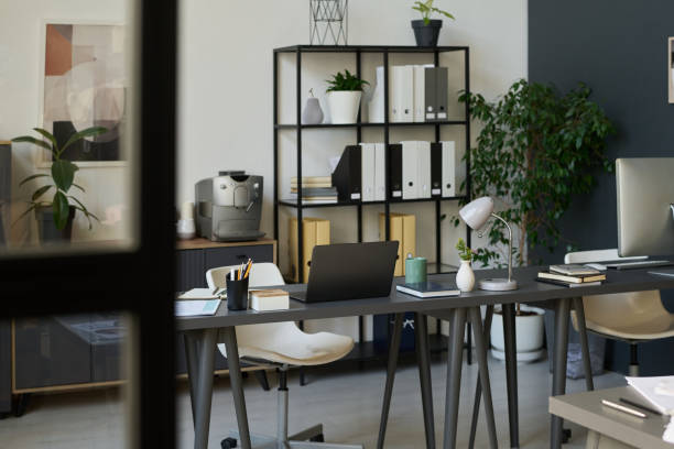 istock Workplaces of coworkers in office 2195835540