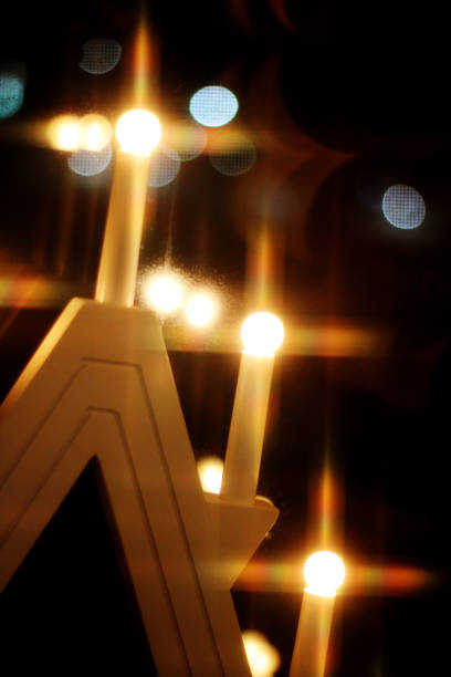 A Christmas lamp shining in the window