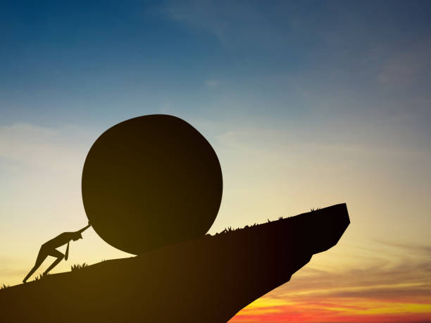 istock Effort and perseverance, businessman pushes a boulder up a high mountain 2195841395