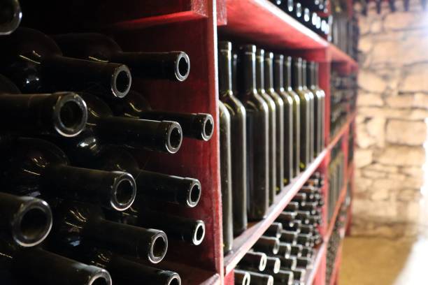 istock Taste the exquisite selection of wine bottles beautifully stored in a rustic cellar 2195842937