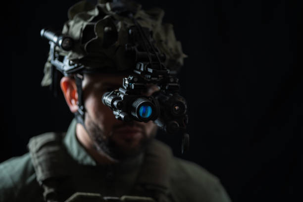 istock A special forces soldier using night vision monocular and thermal imaging device in the darkness. 2195843789