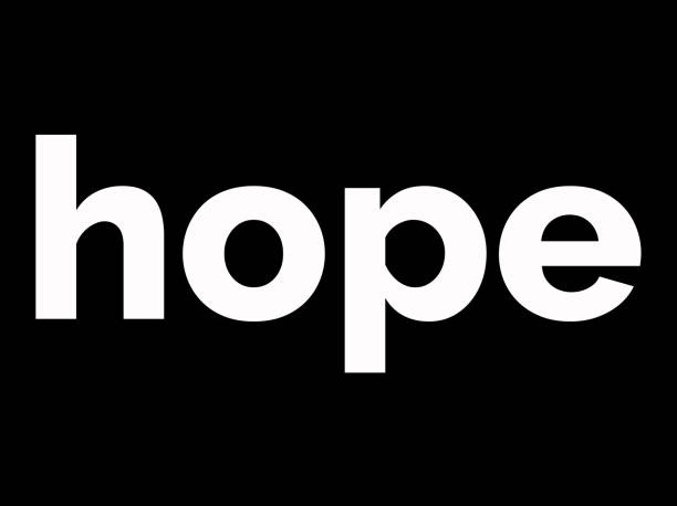 istock `HOPE´as a graphic written sign i black and white with black flames 2195844411