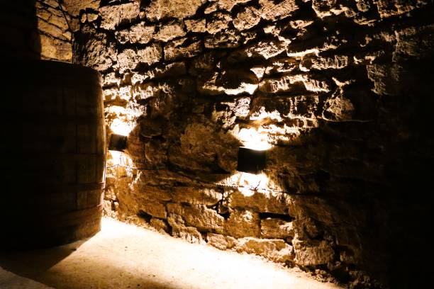 istock A beautifully rustic stone wall paired with warm, inviting lighting in a charming wine cellar 2195844600