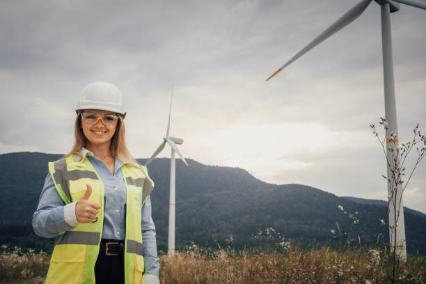 istock This confident female engineer is actively engaged at a wind farm, contributing to the development of renewable energy infrastructure that promotes sustainability and innovation in the industry 2195845644