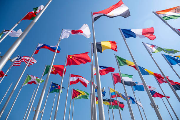 Doha, Qatar - January 24, 2025: The Flag Plaza, displays 119 flags from countries with authorized diplomatic missions, including flags of the European Union, the United Nation and the GCC.