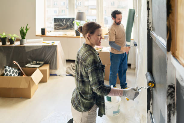 istock Woman renovating room with husband 2195847583