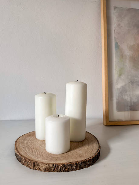 Still life: white candles at home