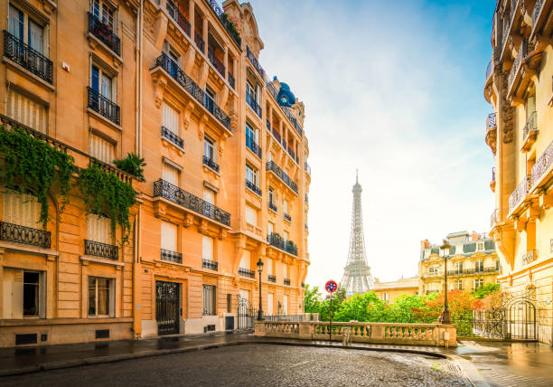 istock eiffel tour and Paris street 2195857159