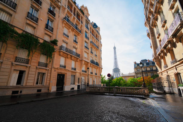 istock eiffel tour and Paris street 2195857168