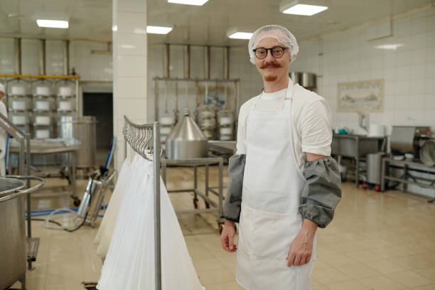 istock Portrait of Industrial Worker in Processing Facility 2195859349