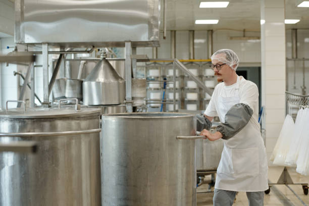 istock Processing Milk Products in Industrial Factory Setting 2195859366
