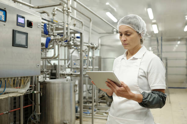 istock Monitoring Industrial Equipment with Digital Tablet 2195859400