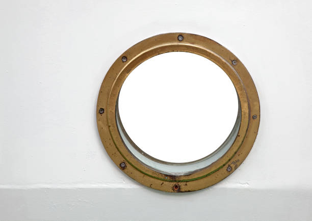 istock porthole on white wooden plank isolated 2195860460