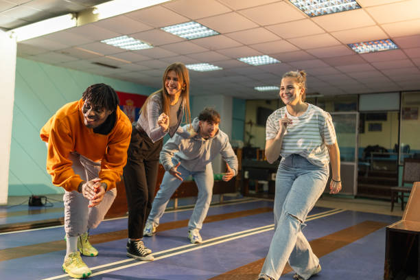 istock Friends having great time together in bowling club 2195864177