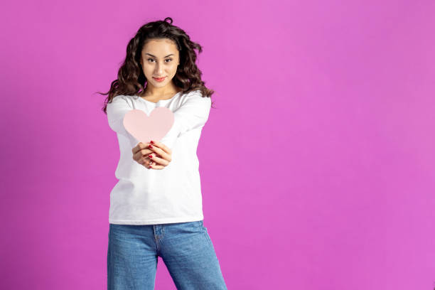 istock Beautiful woman with paper heart 2195866169