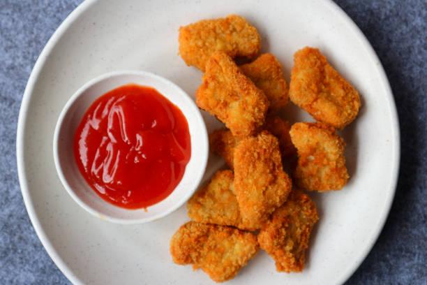 istock french fries with chili sauce in white plate 2195873295
