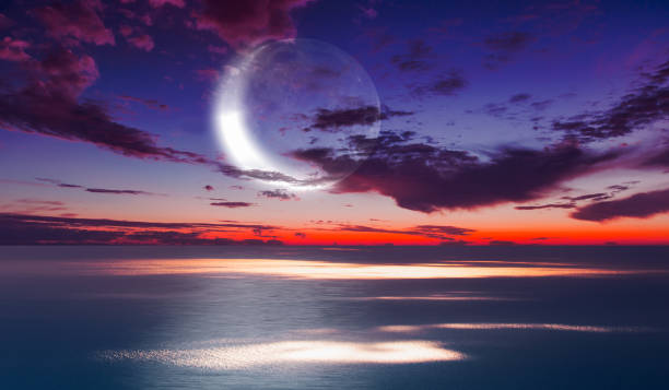 Ramadan concept - Crescent moon over the tropical sea at night